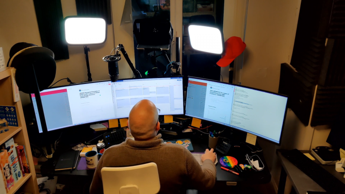 Martin sitting at his desk.